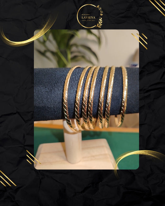Bracelets Joncs Torsadés Dorés – Pack de 7 Pièces