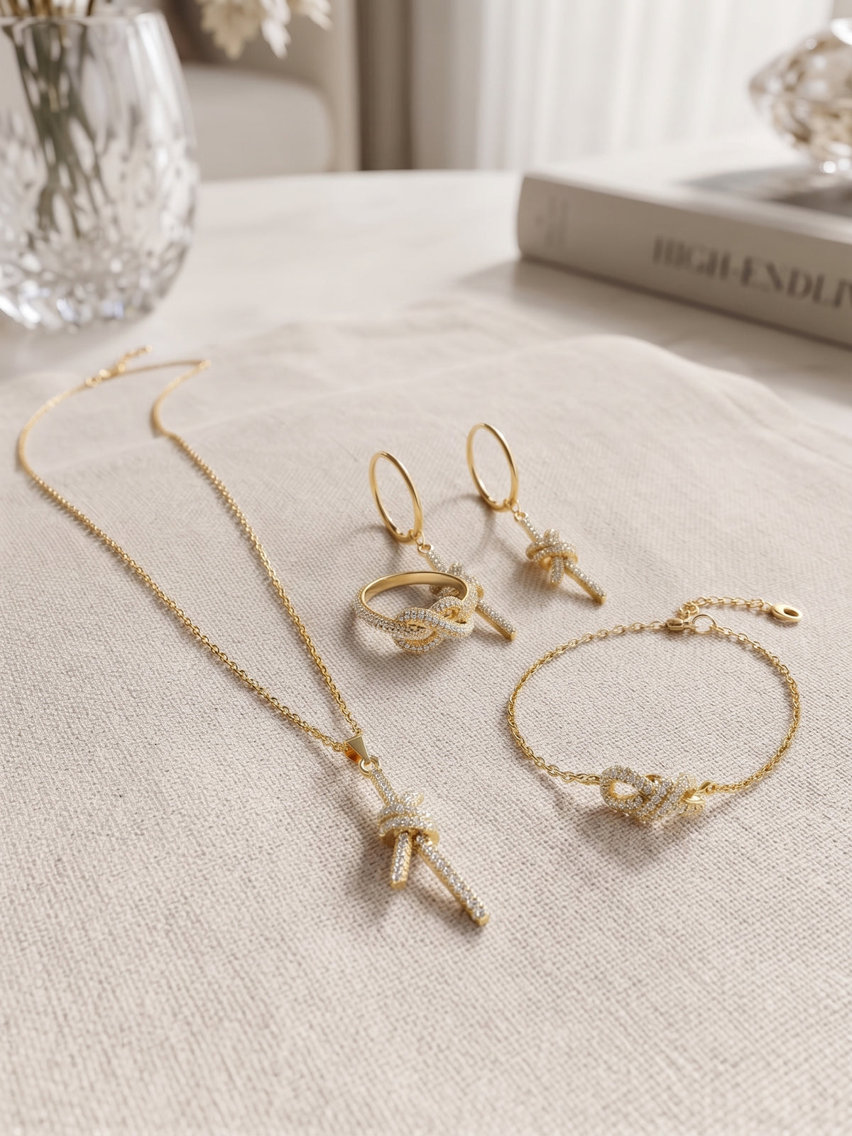 Parure Nœud Scintillant – Collier, Bracelet, Boucles & Bague