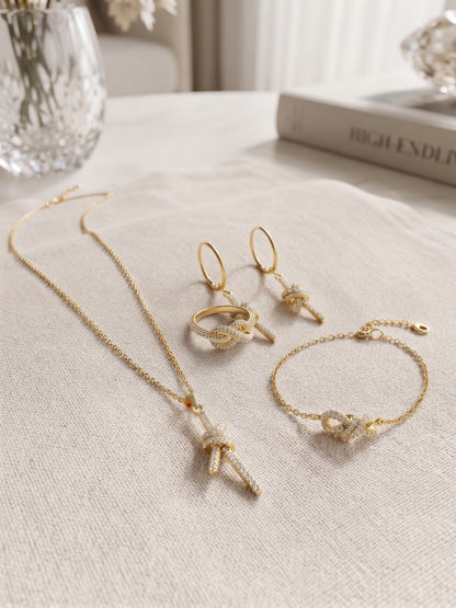 Parure Nœud Scintillant – Collier, Bracelet, Boucles & Bague